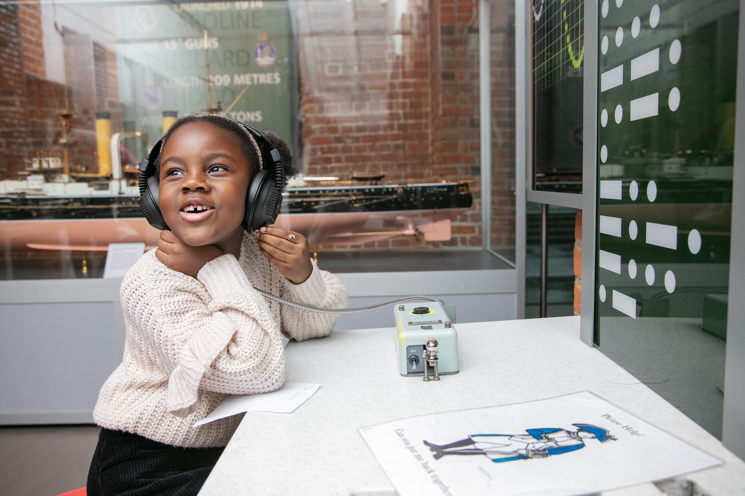 Child exploring the galleries at NMRN